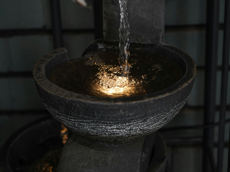 Water Age | a Man Walking by a Stacked Pile of Plastic Water Bottles
