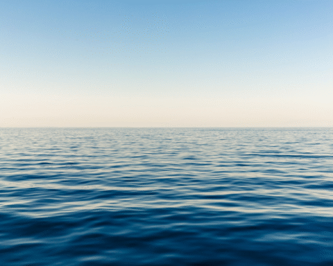 A calm water body with a smooth surface, illustrating water age and the effects of time on still water.