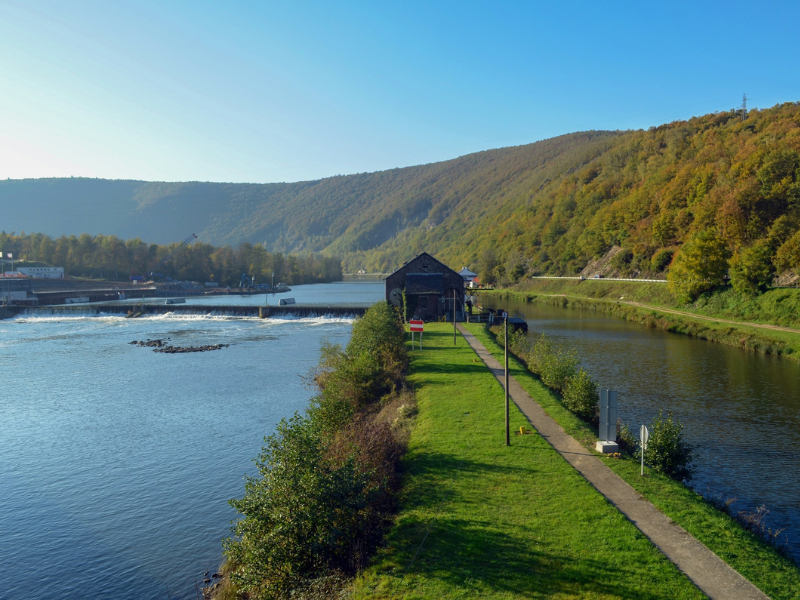 Wooden House Near Water During Daytime