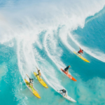 People Surfing on the Beach | Surf Culture