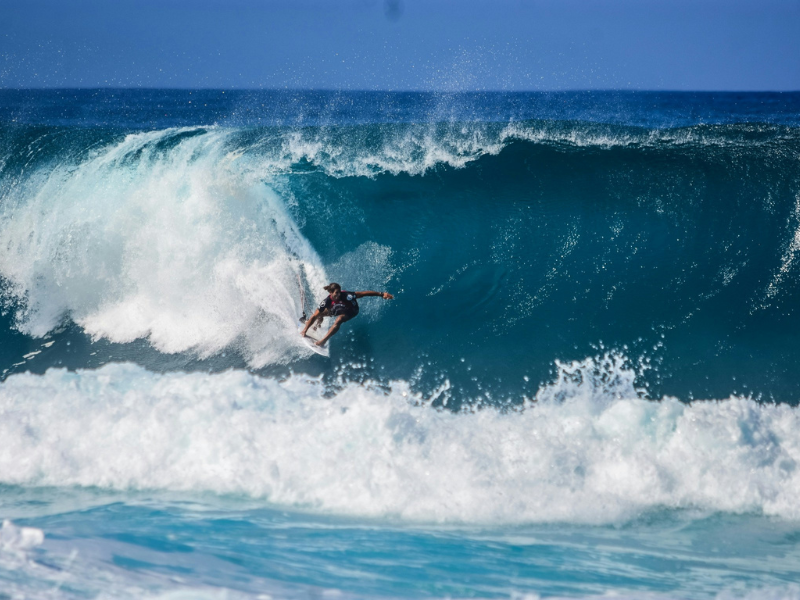 People surfing on the beach | Surf Culture
