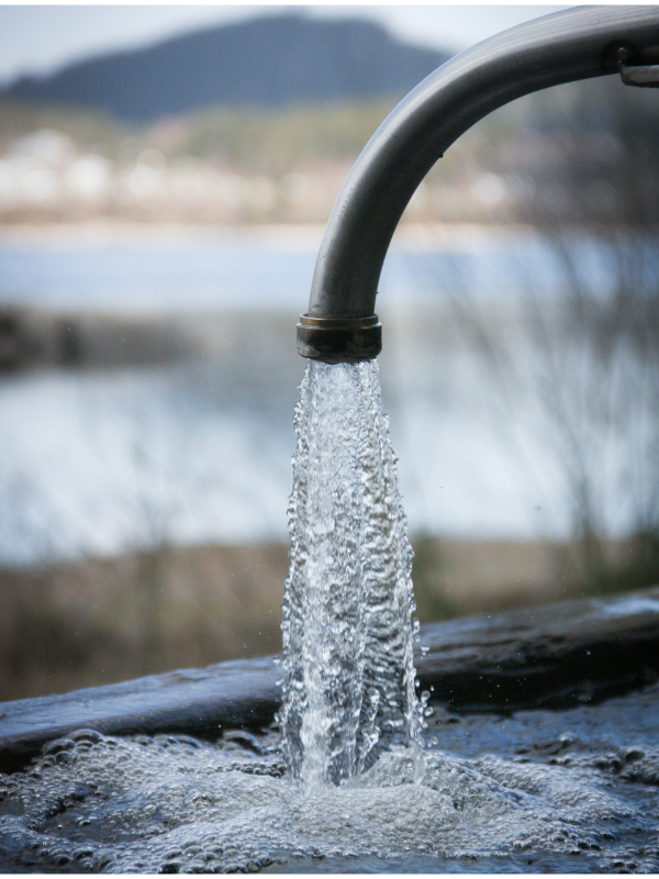 Spigot with water dropping from the tap