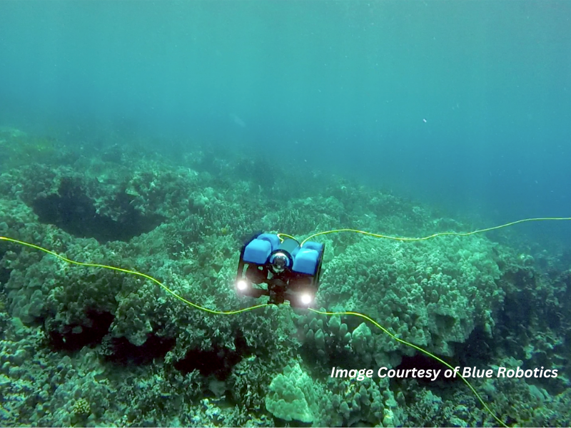 An underwater ocean drone surveys a coral reef, demonstrating how ocean drones are advancing marine research, underwater exploration, and ocean conservation.