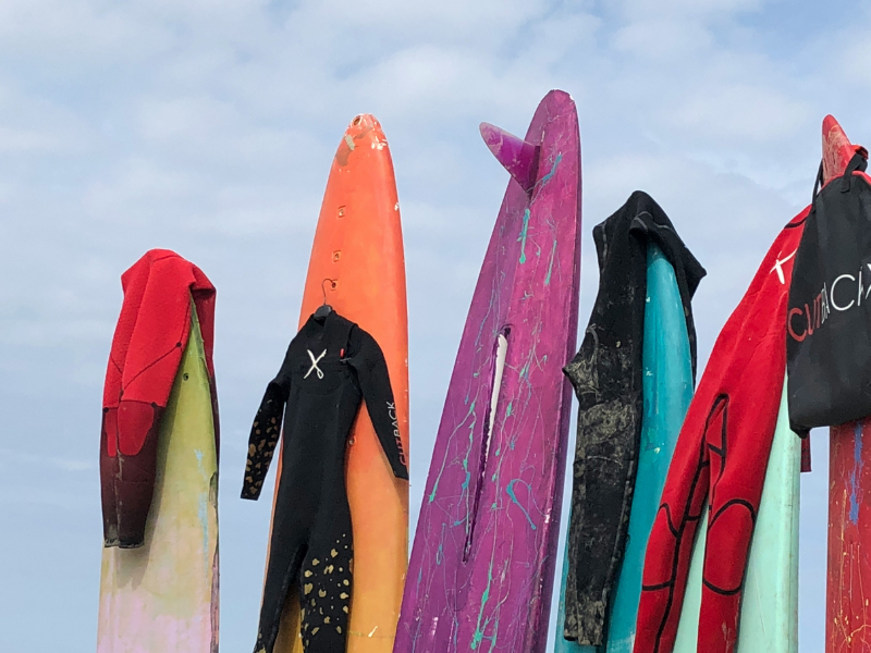 Water and gear meet at the shoreline, where wetsuits and boards must withstand repeated exposure to salt, sun, movement and changing coastal conditions.