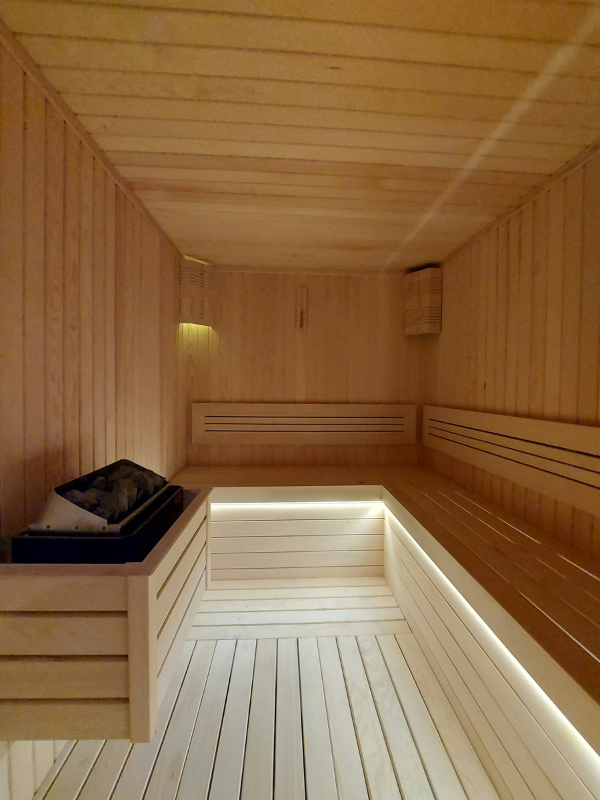 A traditional Finnish sauna, where warmth and simplicity preserve the enduring culture of communal bathing.