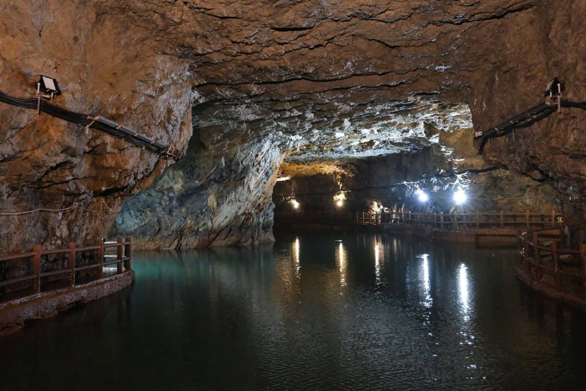 Water flowing through a natural landscape, representing how water can be stored underground to replenish aquifers.